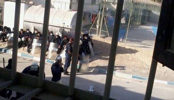 Security forces raid a building in Jaw Prison to suppress protesting inmates