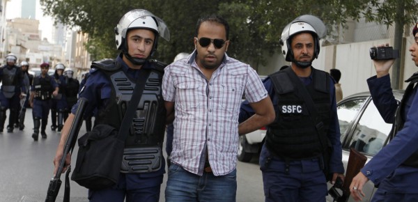 Activist Ali Haji during his arrest